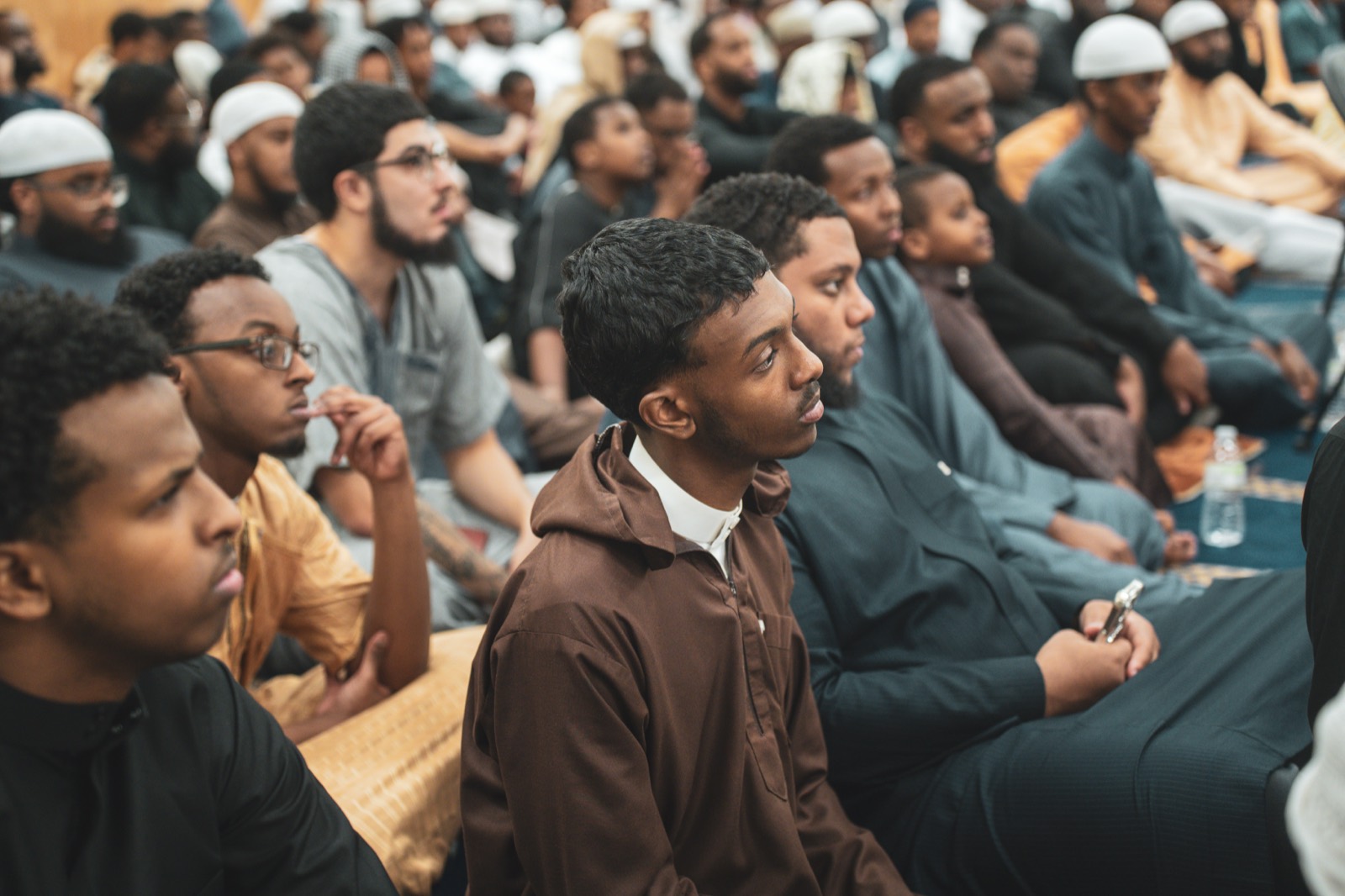 Students gathered at an Athar majlis
